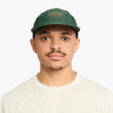 Gorra de running Ciele GOCap Long Brim EQ Athletics, color Spruce – en uso