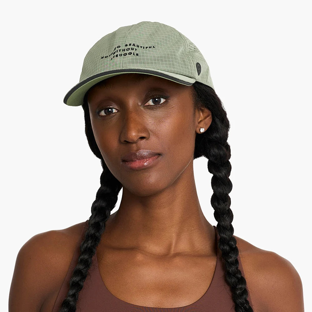 Gorra de running Ciele CRWCap SC Icon Side Circle, color Toad – en uso